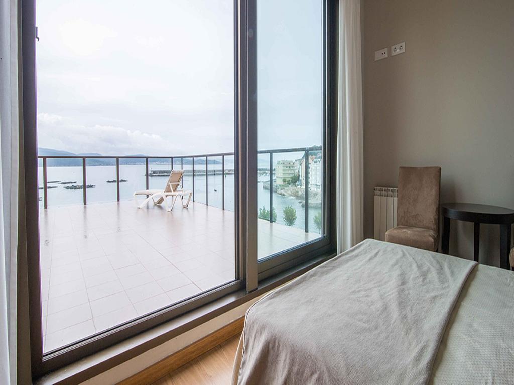 Apartamentos Turisticos Playa De Osmo Corme Εξωτερικό φωτογραφία