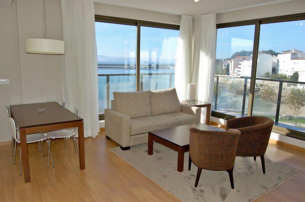 Apartamentos Turisticos Playa De Osmo Corme Εξωτερικό φωτογραφία