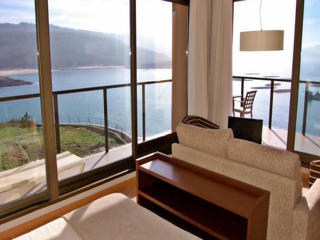 Apartamentos Turisticos Playa De Osmo Corme Εξωτερικό φωτογραφία